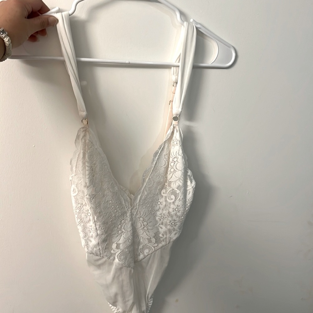 White plunge body suit